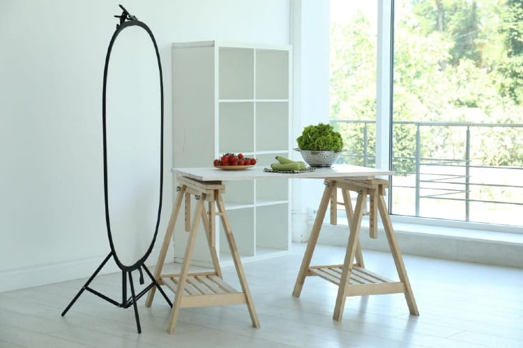 Position your setup near a north-facing window (in the Northern Hemisphere) for soft, diffused light that's perfect for still life photography